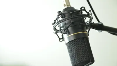 Studio condenser microphone in a shock mount for voice recording, featured in the Murf AI review