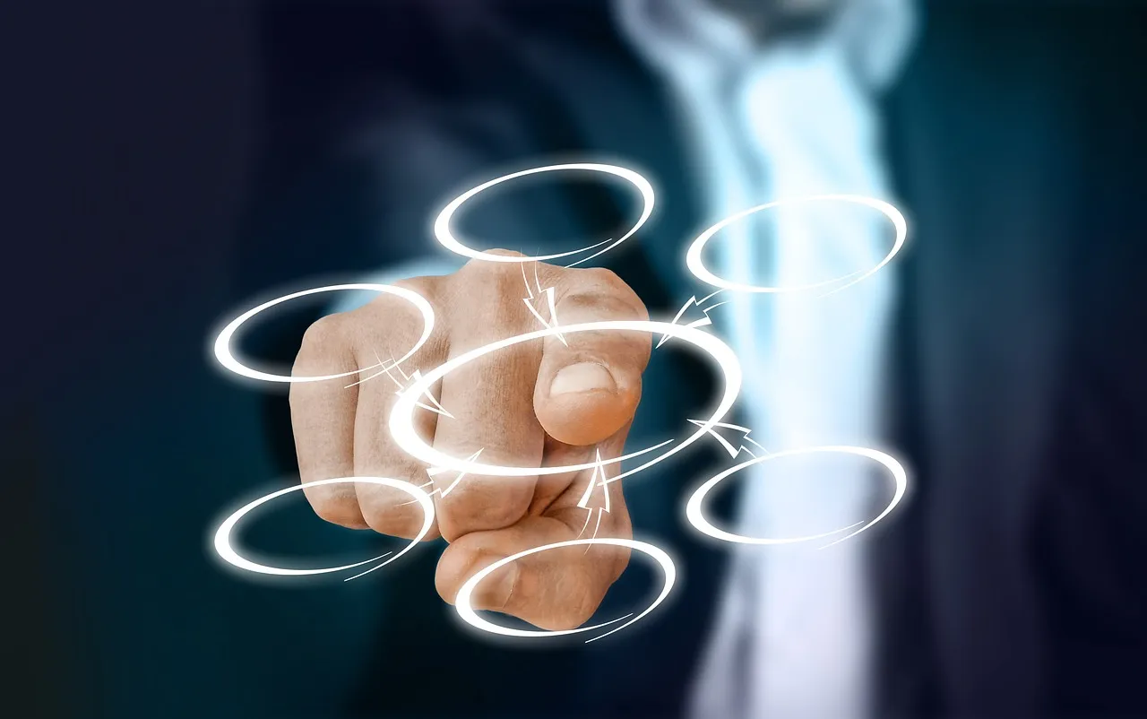 Businessman touching a virtual digital interface with glowing circles, representing AI automation workflows