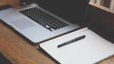 Laptop on a desk running LM Studio local AI models for small business