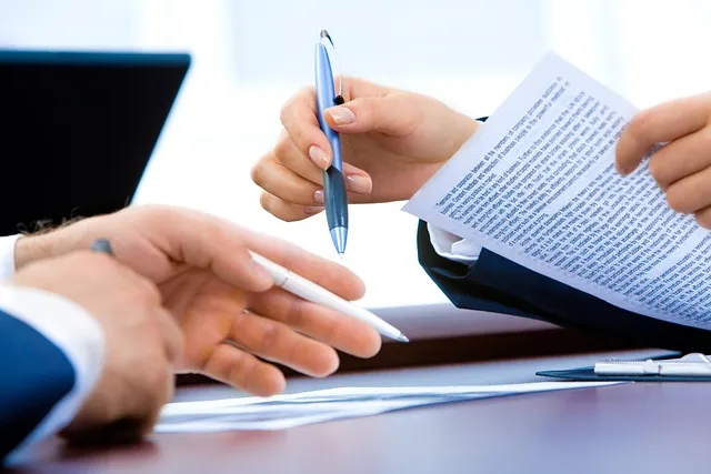 Business documents on a desk used for AnythingLLM private AI chatbot