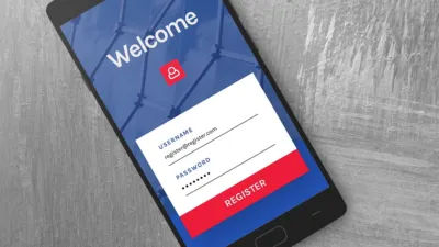 Hand holding a key over a laptop with a login form on screen — 1Password for Agents lets AI agents sign in without seeing passwords